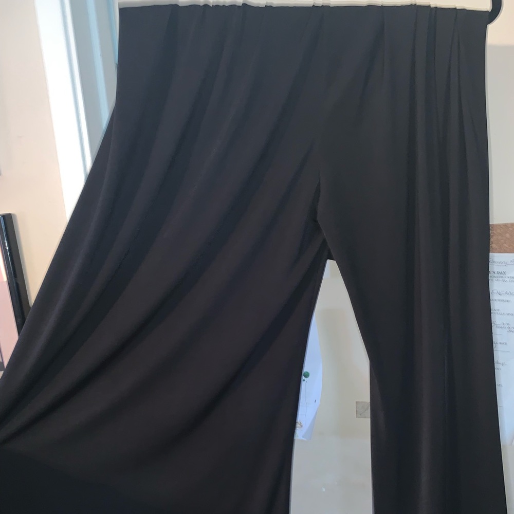Black wide leg, flowy pants.